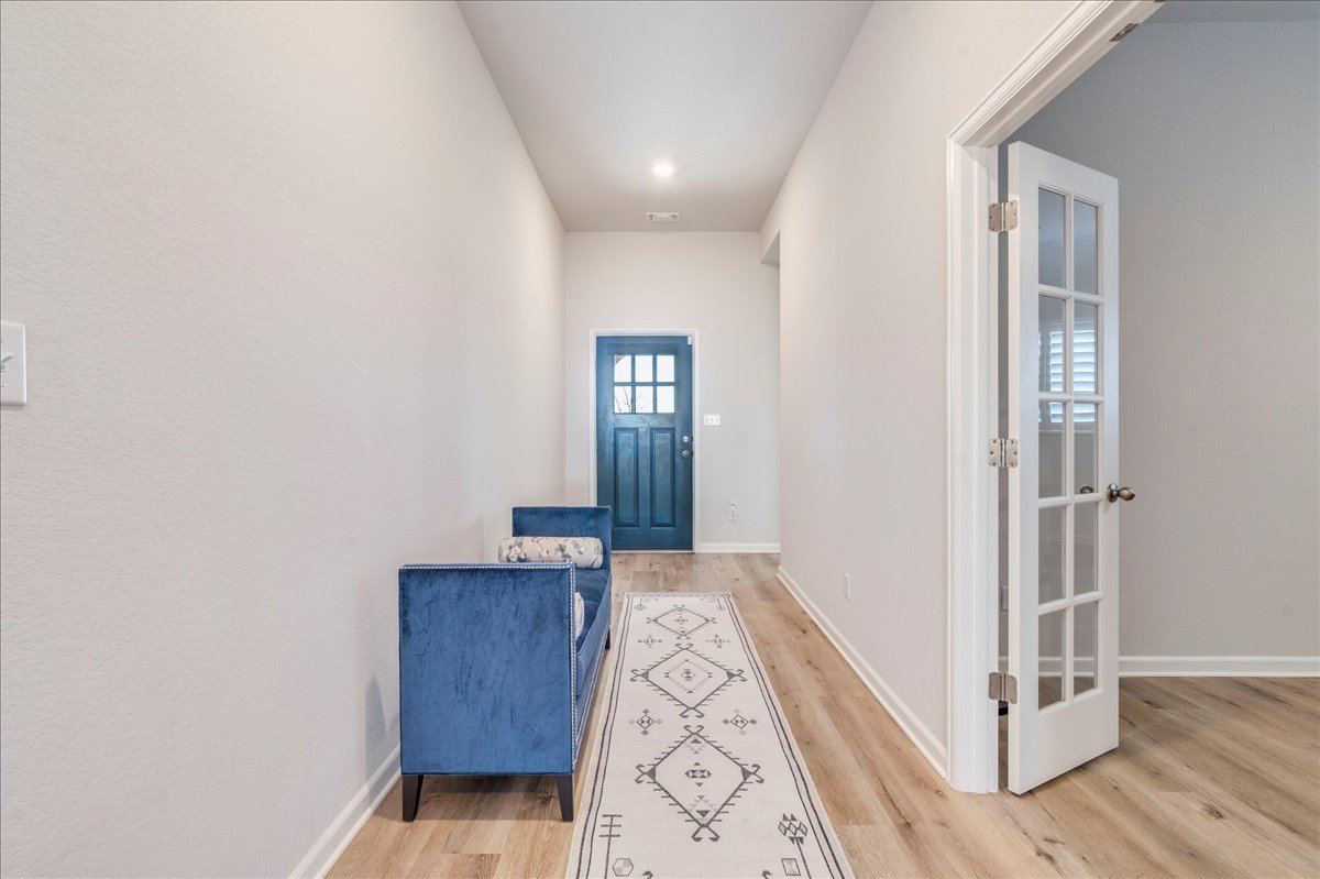 200 Christi Court Kyle, TX 78640 - Photo 4 of 40 Entryway with wood finished floors and recessed lighting