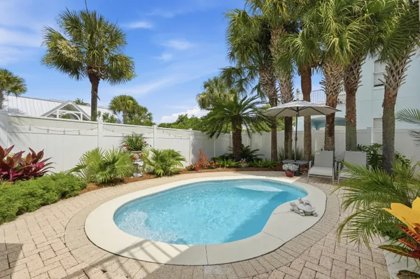 a view of a backyard with a patio