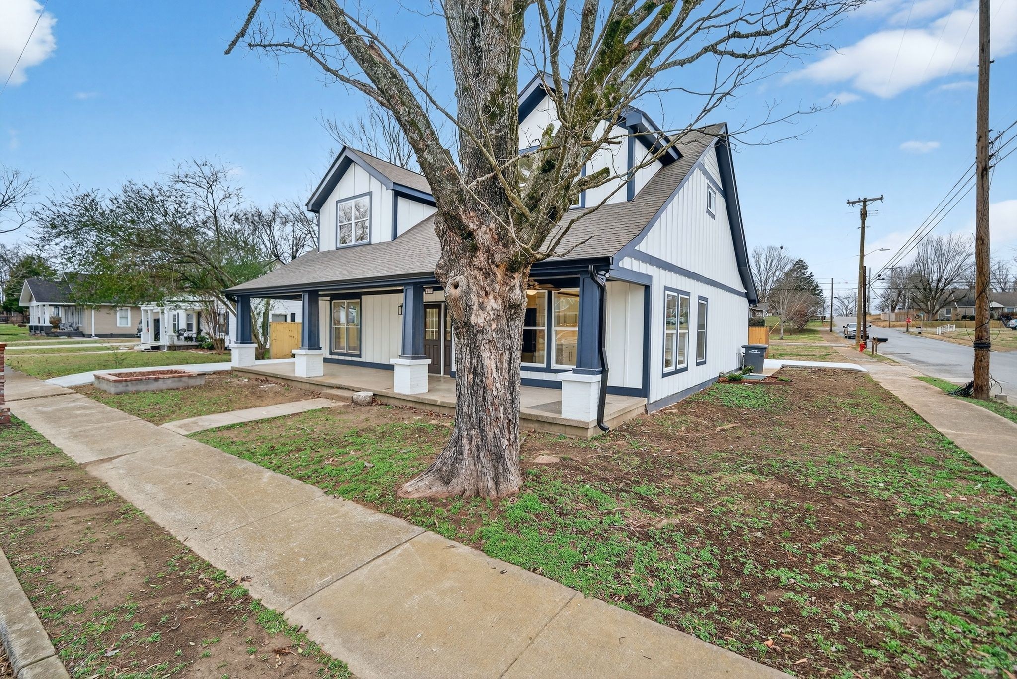 410 3rd Avenue Fayetteville, TN 37334 - Photo 3 of 49 a front view of a house with a yard