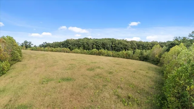 a view of mountain with sunset