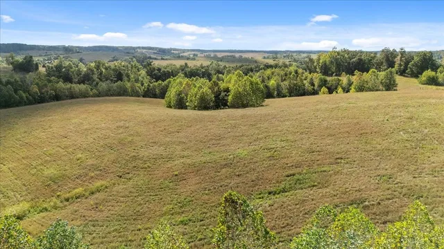 a view of mountain with lake view