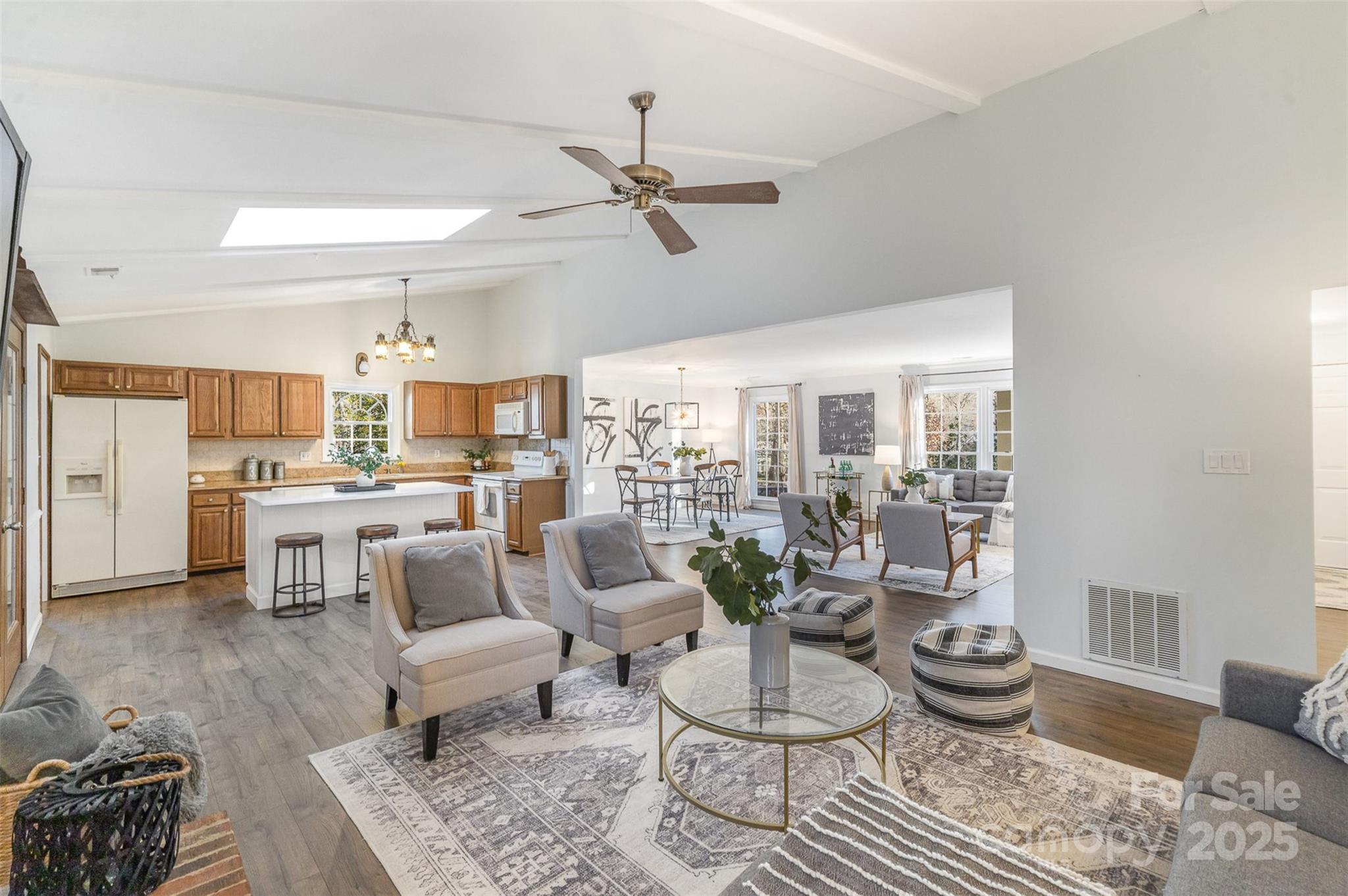 748 Trail Ridge Road Matthews, NC 28105 - Photo 8 of 29 a living room with furniture and a potted plant
