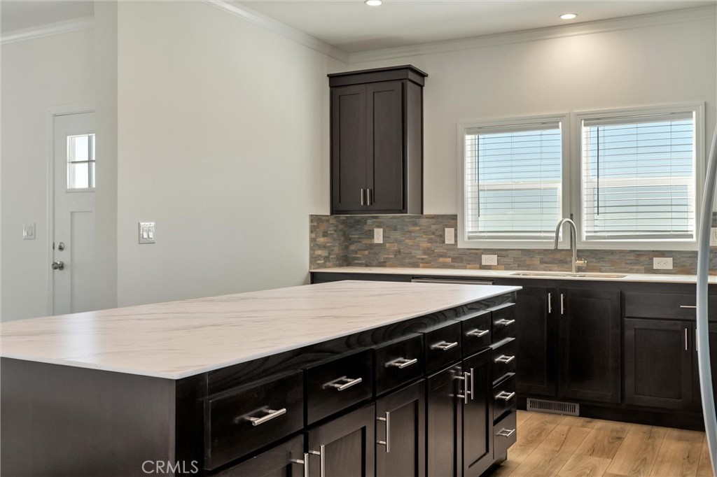 4333 Pentz Road, Unit 30 Paradise, CA 95969 - Photo 17 of 29 a kitchen with a sink a stove cabinets and a window