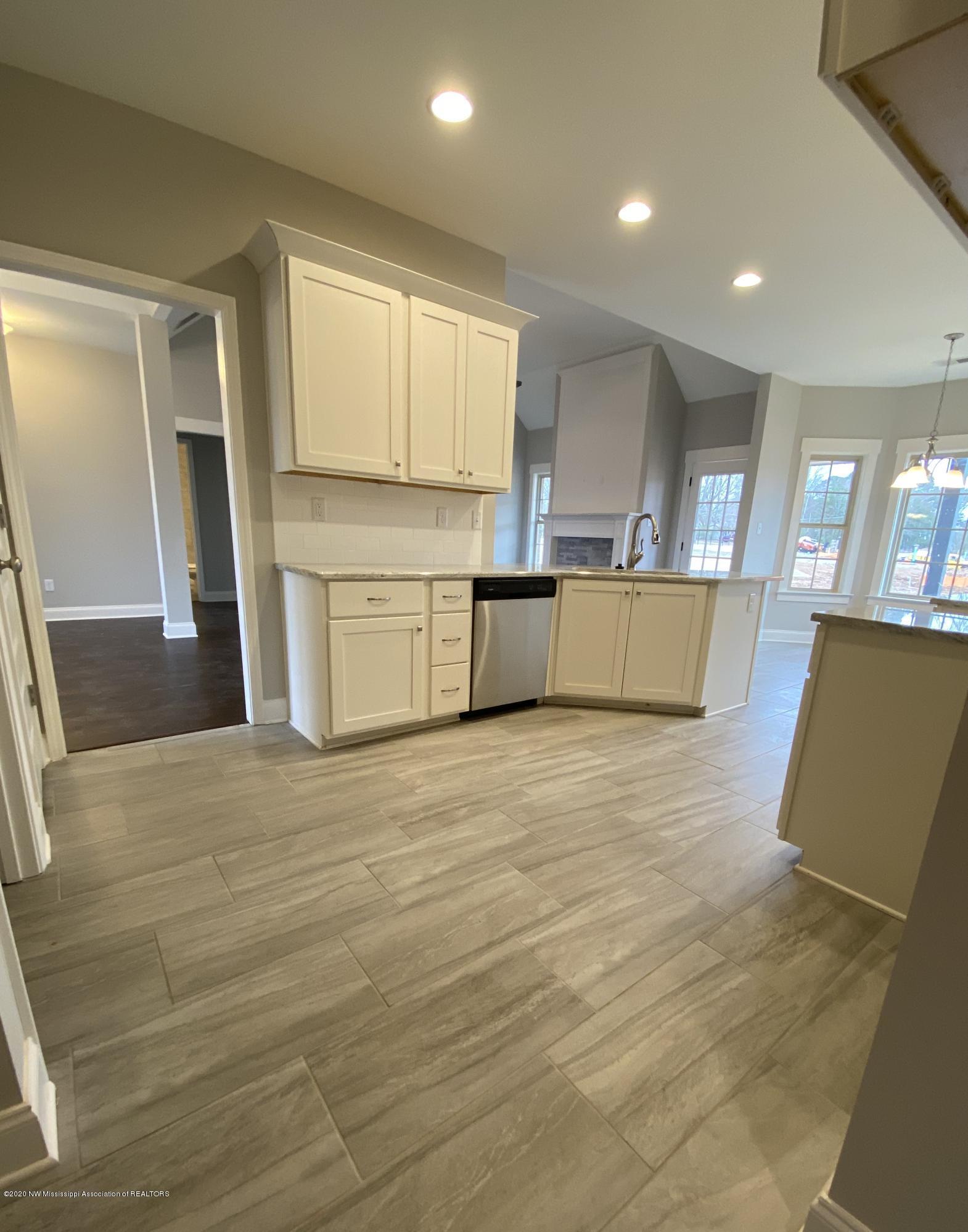 537 Howell Way Hernando, MS 38632 - Photo 13 of 22 Kitchen view from stairs to bonus