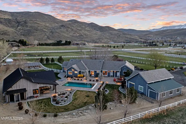 an aerial view of a house with garden