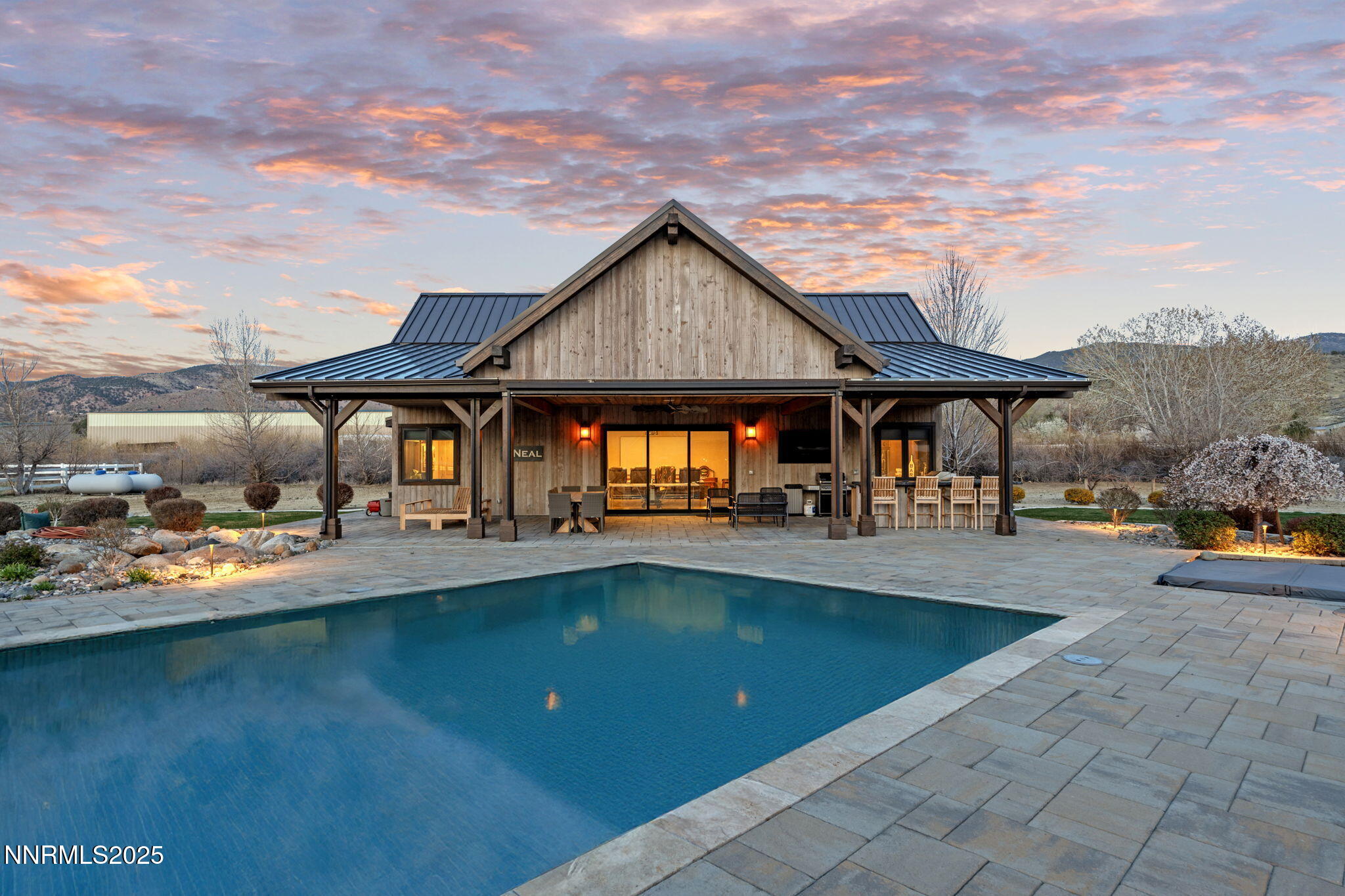 1020 North Cantlon Lane Reno, NV 89521 - Photo 22 of 28 a view of a house with swimming pool and sitting area