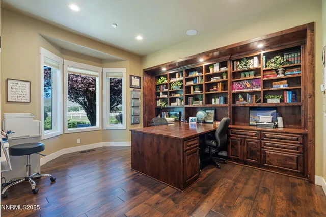 a view of a house with a backyard porch and sitting area