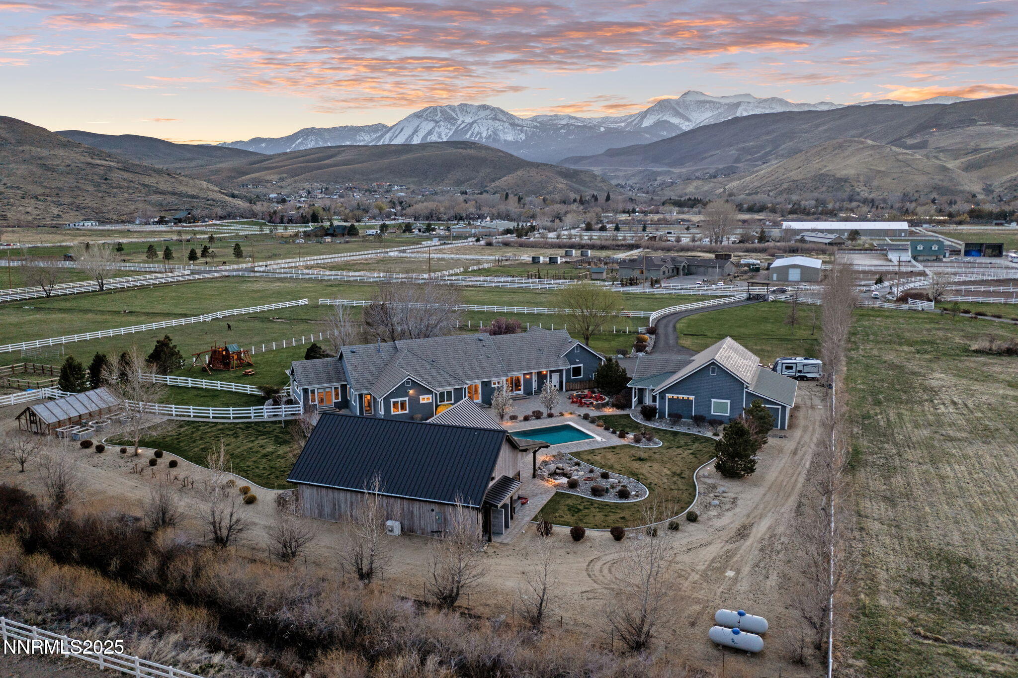 1020 North Cantlon Lane Reno, NV 89521 - Photo 3 of 28 a view of a lake with a mountain