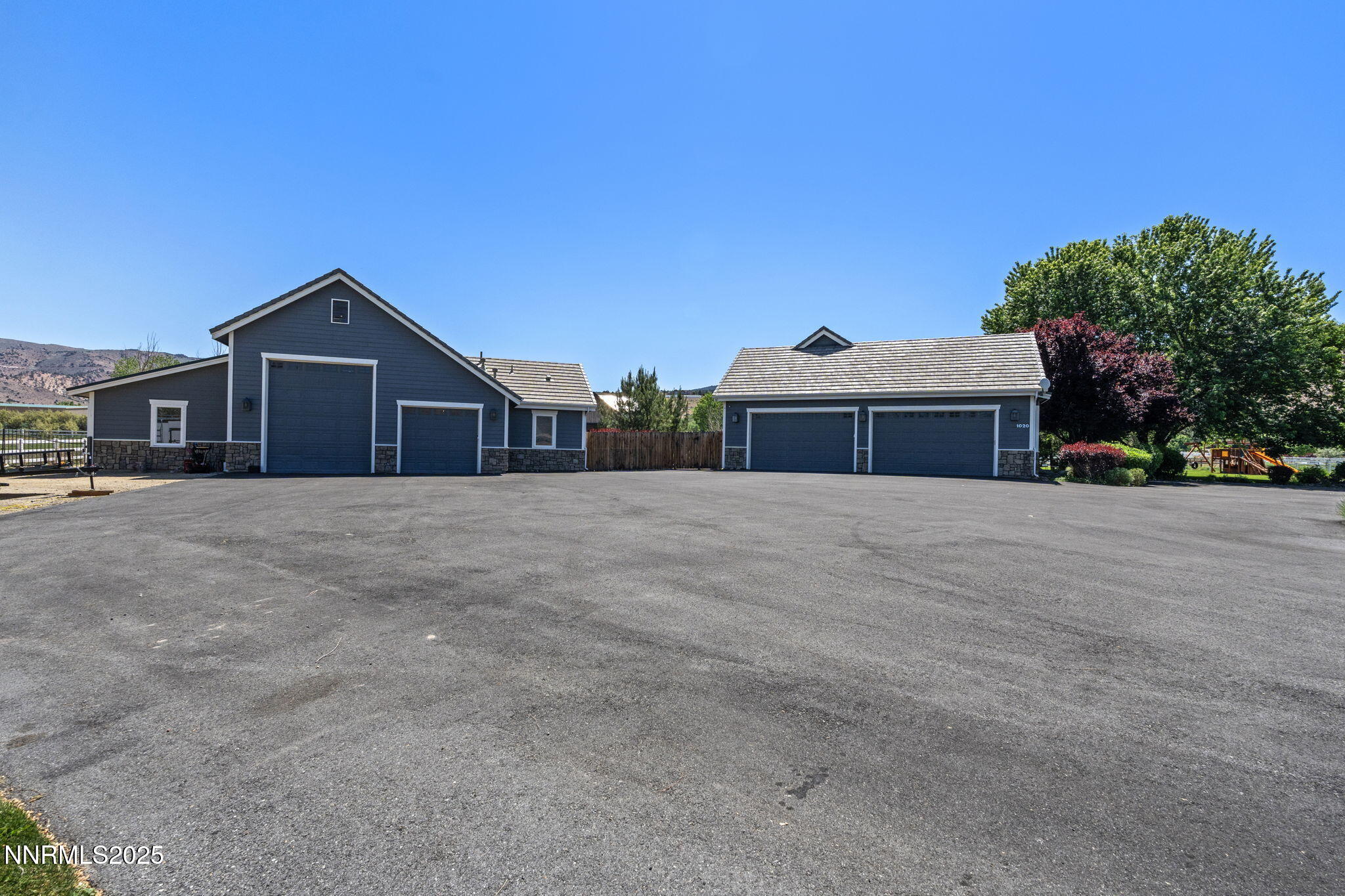 1020 North Cantlon Lane Reno, NV 89521 - Photo 6 of 28 a front view of a house with a yard