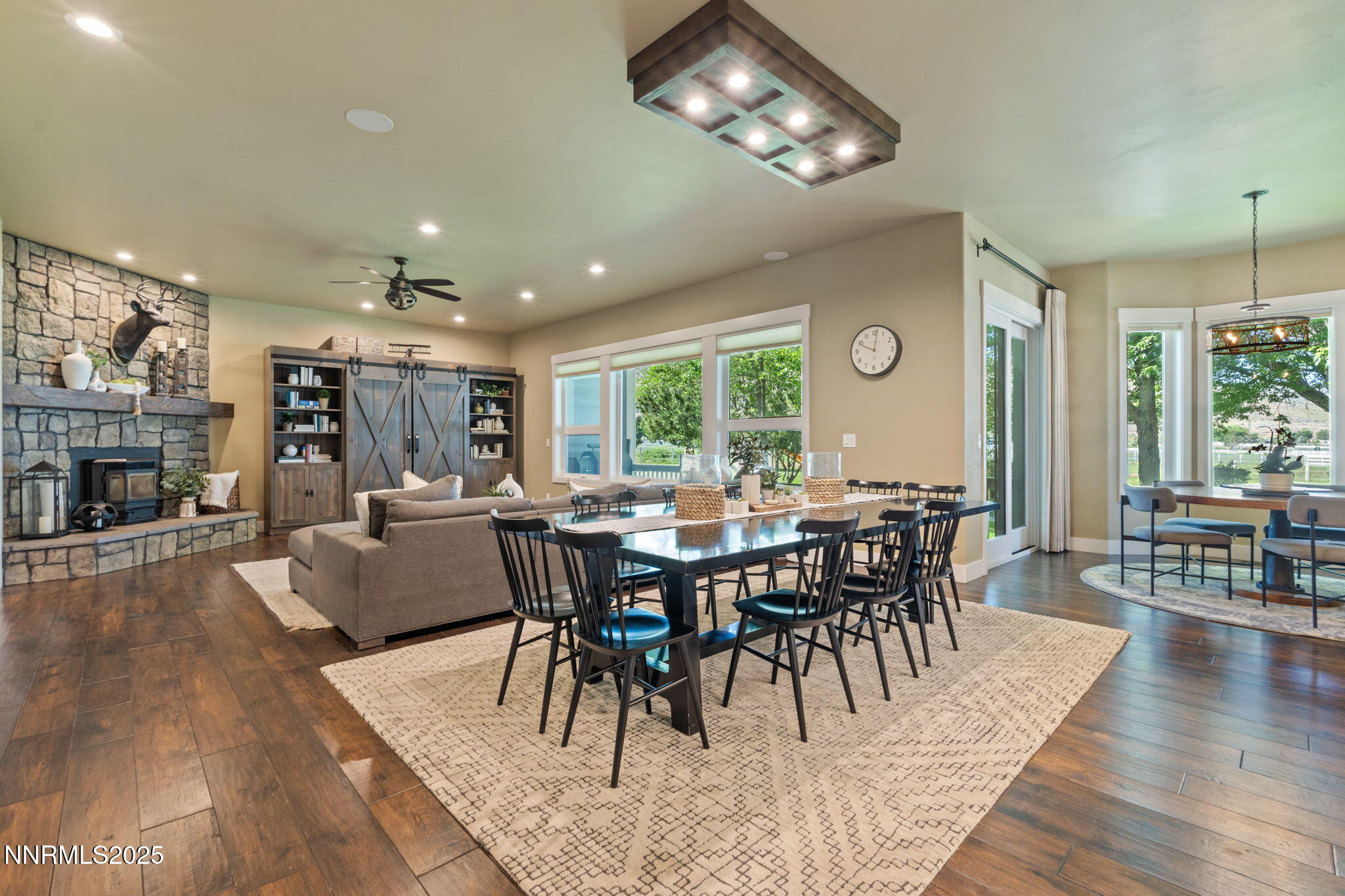 1020 North Cantlon Lane Reno, NV 89521 - Photo 10 of 28 a view of a dining room with furniture window and wooden floor