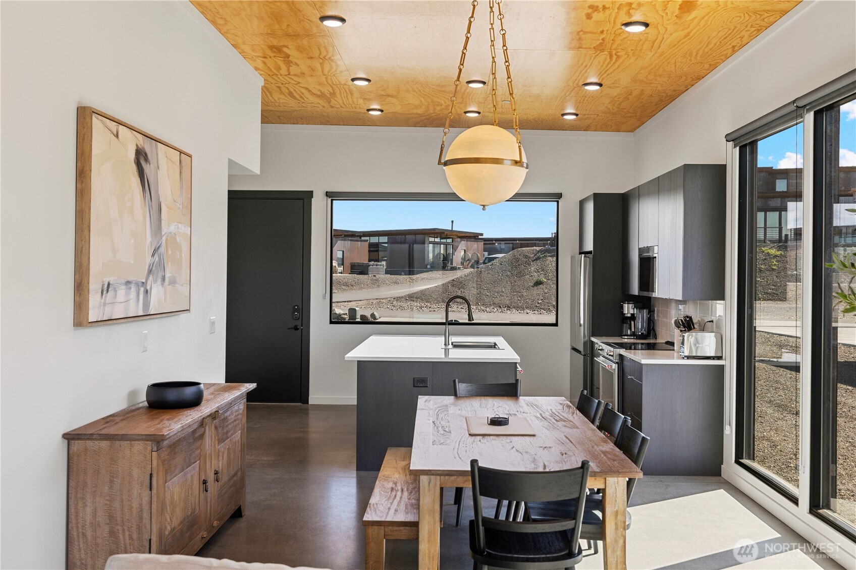 202 Rattlesnake Pt Road Northwest Quincy, WA 98848 - Photo 13 of 37 a view of kitchen and dining area with furniture