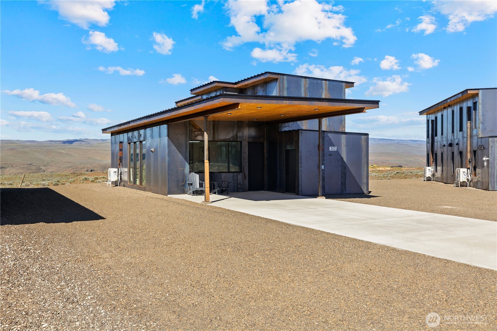 202 Rattlesnake Pt Road Northwest Quincy, WA 98848 - Photo 2 of 37 a view of a house with a outdoor space