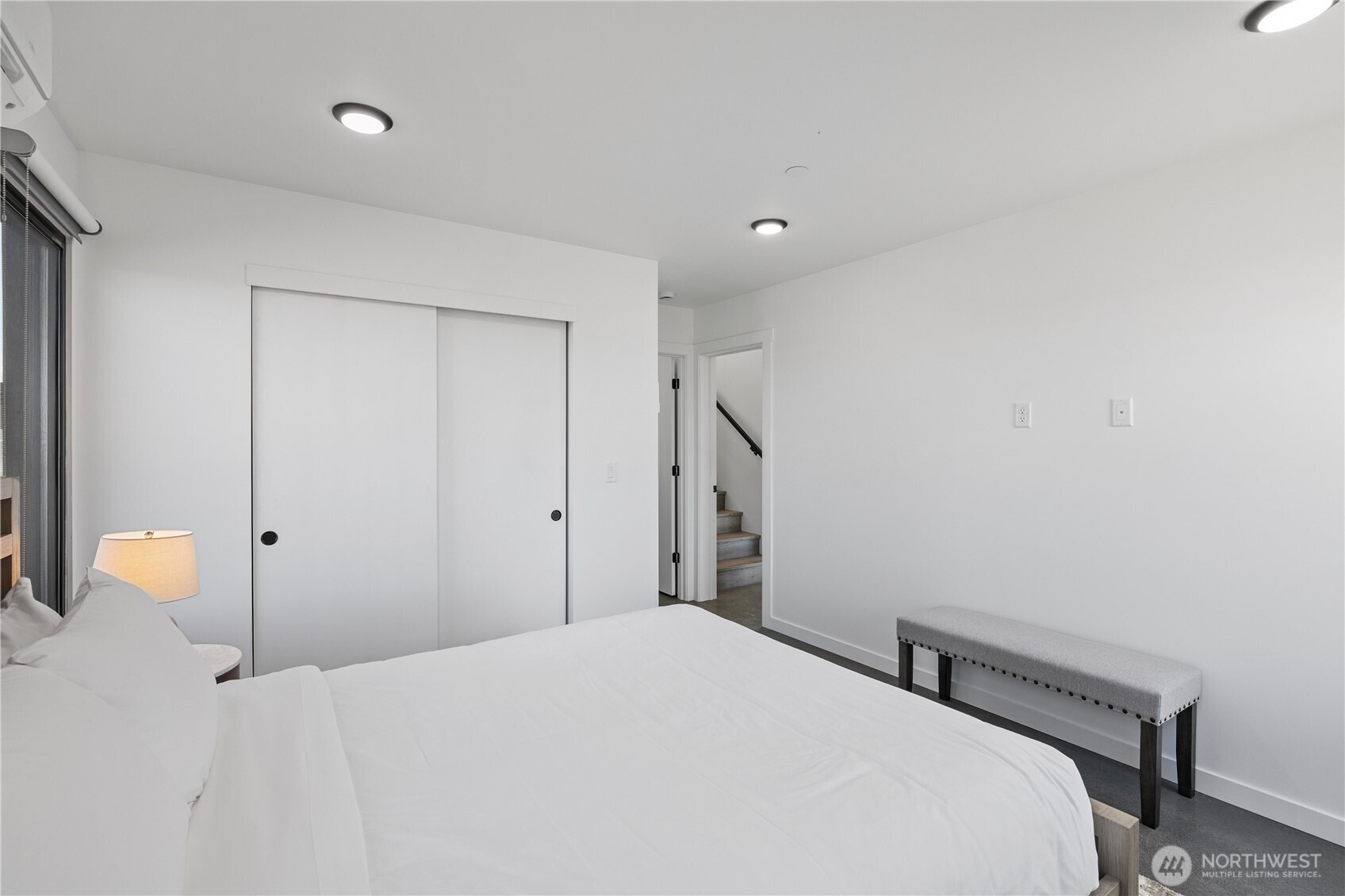 202 Rattlesnake Pt Road Northwest Quincy, WA 98848 - Photo 24 of 37 a bedroom with a bed and lamp