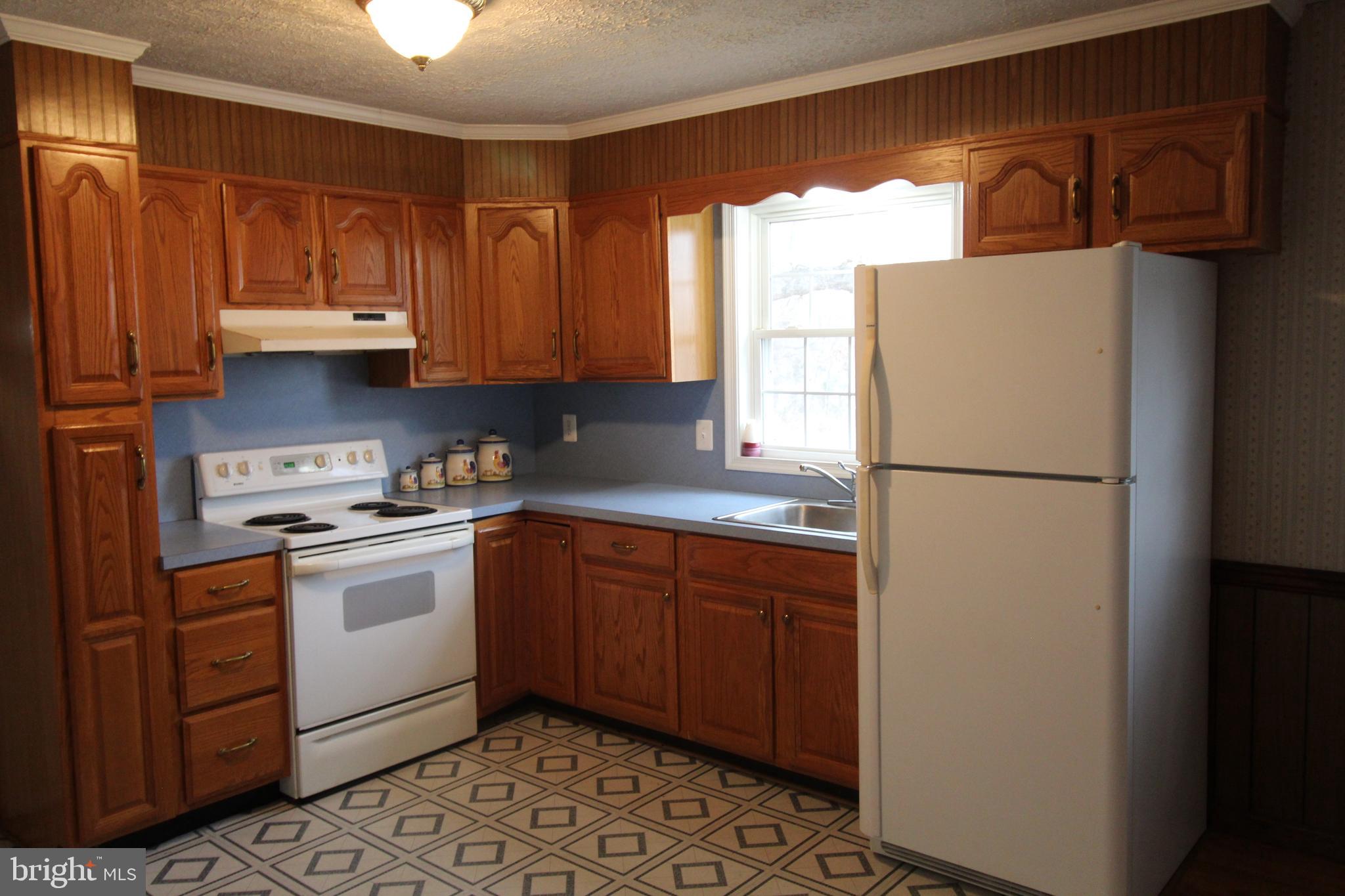 Kitchen with updated cabinets