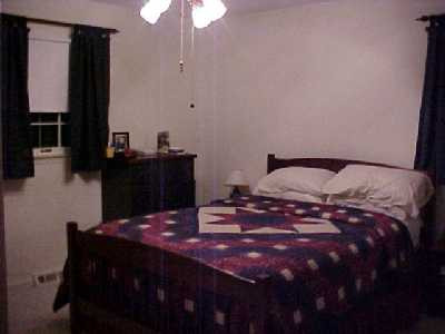 The master bedroom measures approx. 12'