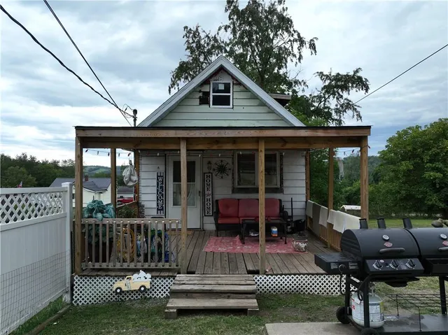 a front view of a house with porch