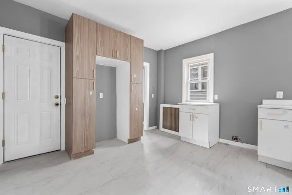 a view of empty room with windows