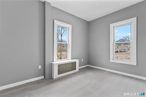 an empty room with windows