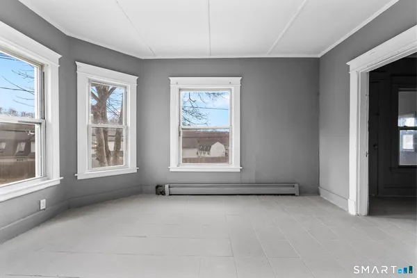 an empty room with windows