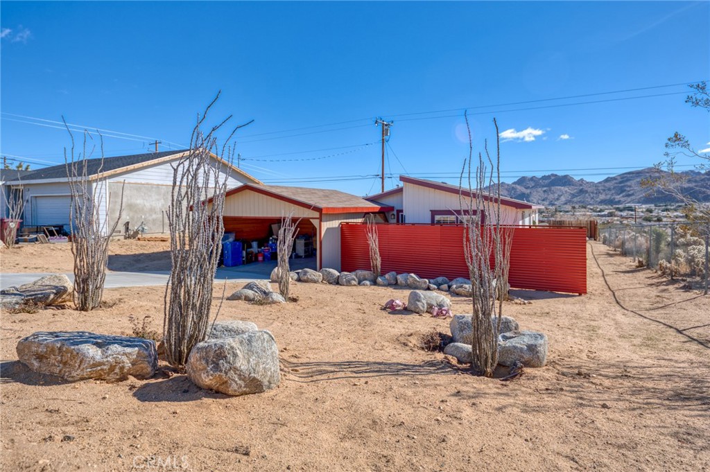 6127 Panorama Road Joshua Tree, CA 92252 - Photo 1 of 1 a view of a house with wooden floor