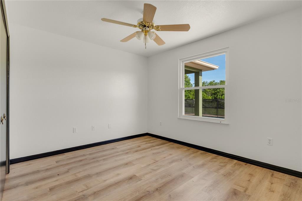 4831 Rummell Road St. Cloud, FL 34771 - Photo 19 of 37 a view of an empty room with a window