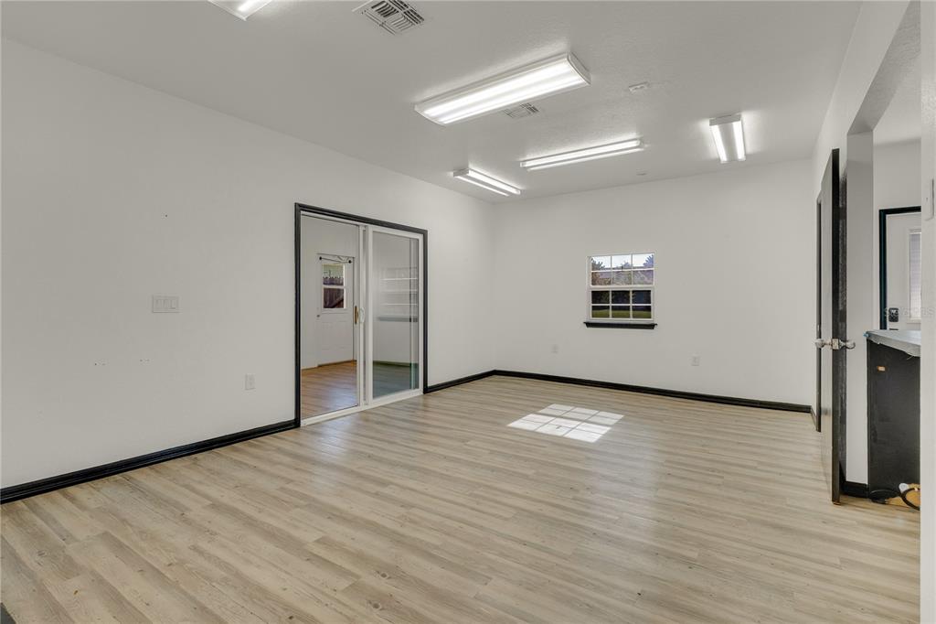 4831 Rummell Road St. Cloud, FL 34771 - Photo 27 of 37 a view of an empty room with a window