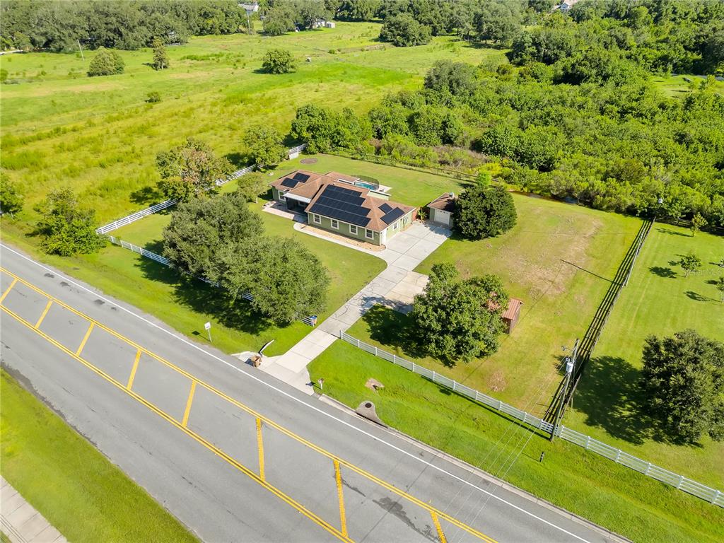 4831 Rummell Road St. Cloud, FL 34771 - Photo 32 of 37 a view of a garden with an outdoor space