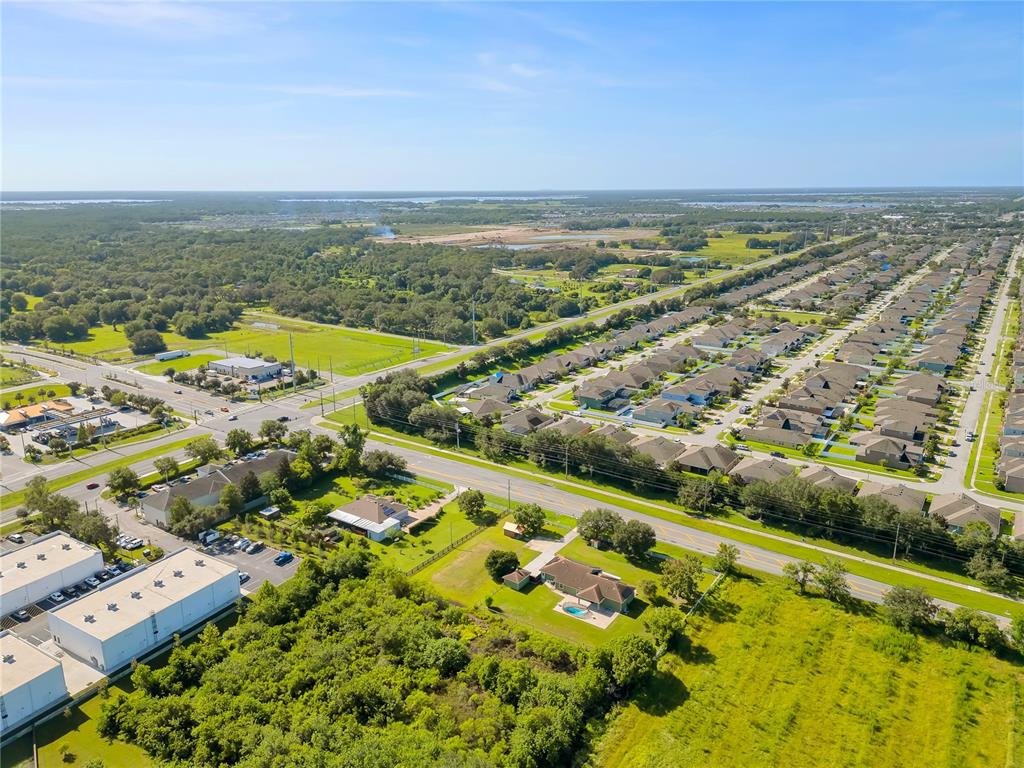 4831 Rummell Road St. Cloud, FL 34771 - Photo 34 of 37 an aerial view of residential building and lake