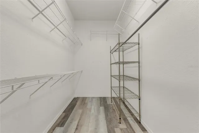 a view of a room with racks on the wall