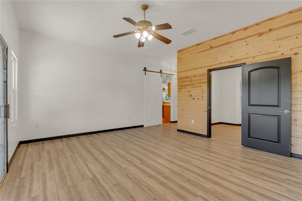 4831 Rummell Road St. Cloud, FL 34771 - Photo 10 of 37 a view of an empty room with a window