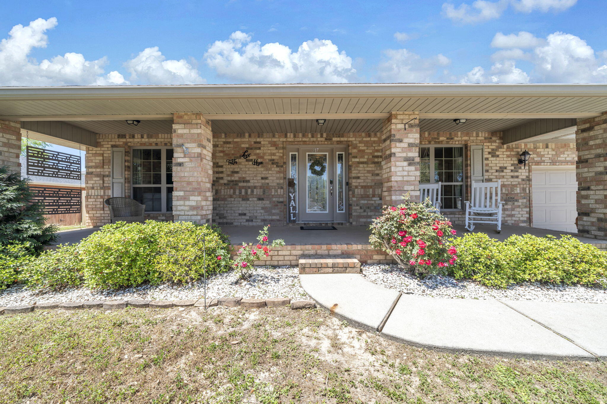 217 Raptor Drive Crestview, FL 32536 - Photo 5 of 48 a view of a house with flower plants