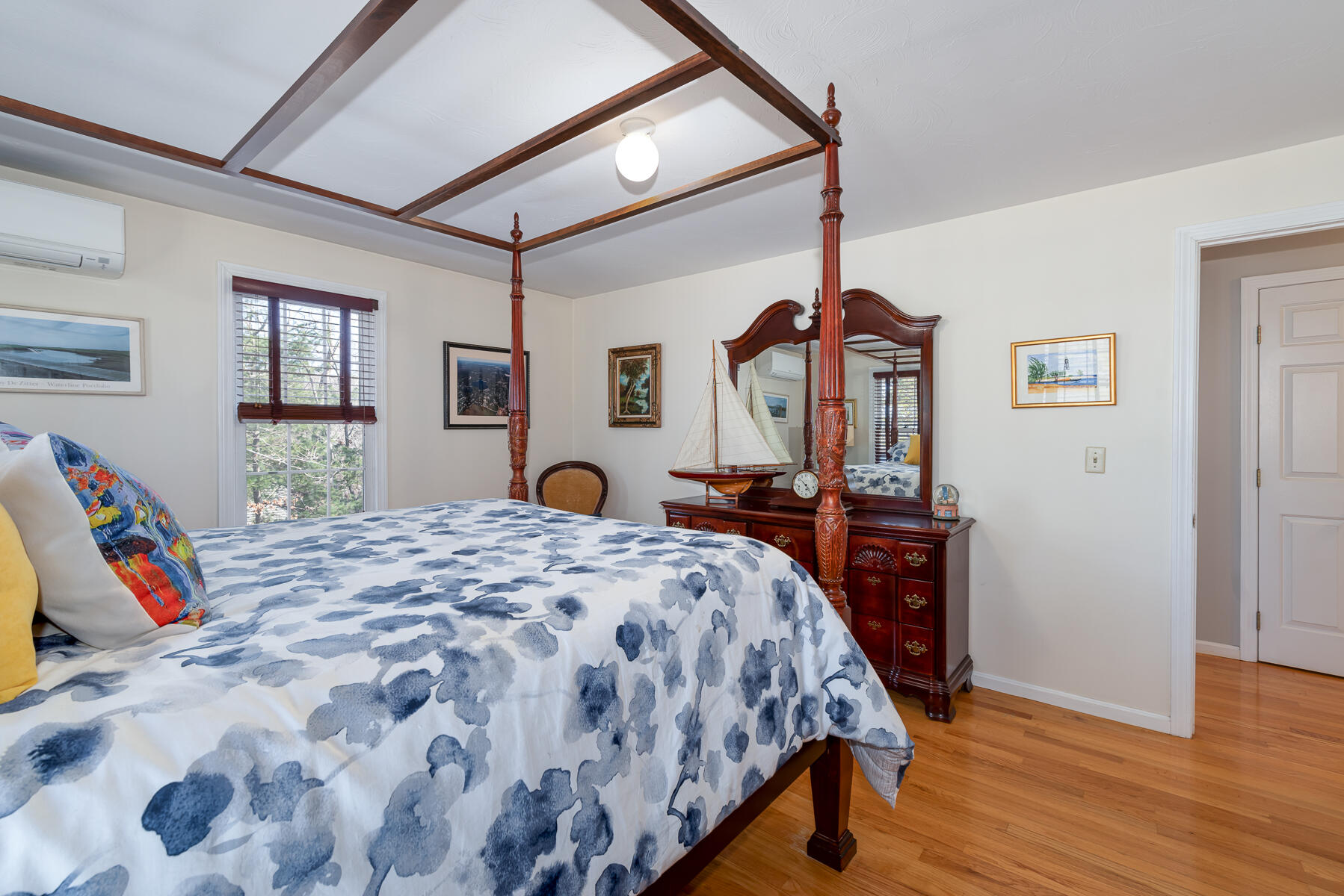 1 Country Farm Road Forestdale, MA 02644 - Photo 29 of 54 a bedroom with a bed a dresser and wooden floor