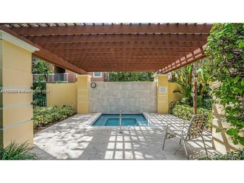 6790 West Sample Road, Unit 6790 Coral Springs, FL 33067 - Photo 2 of 26 a black and white photo of a house