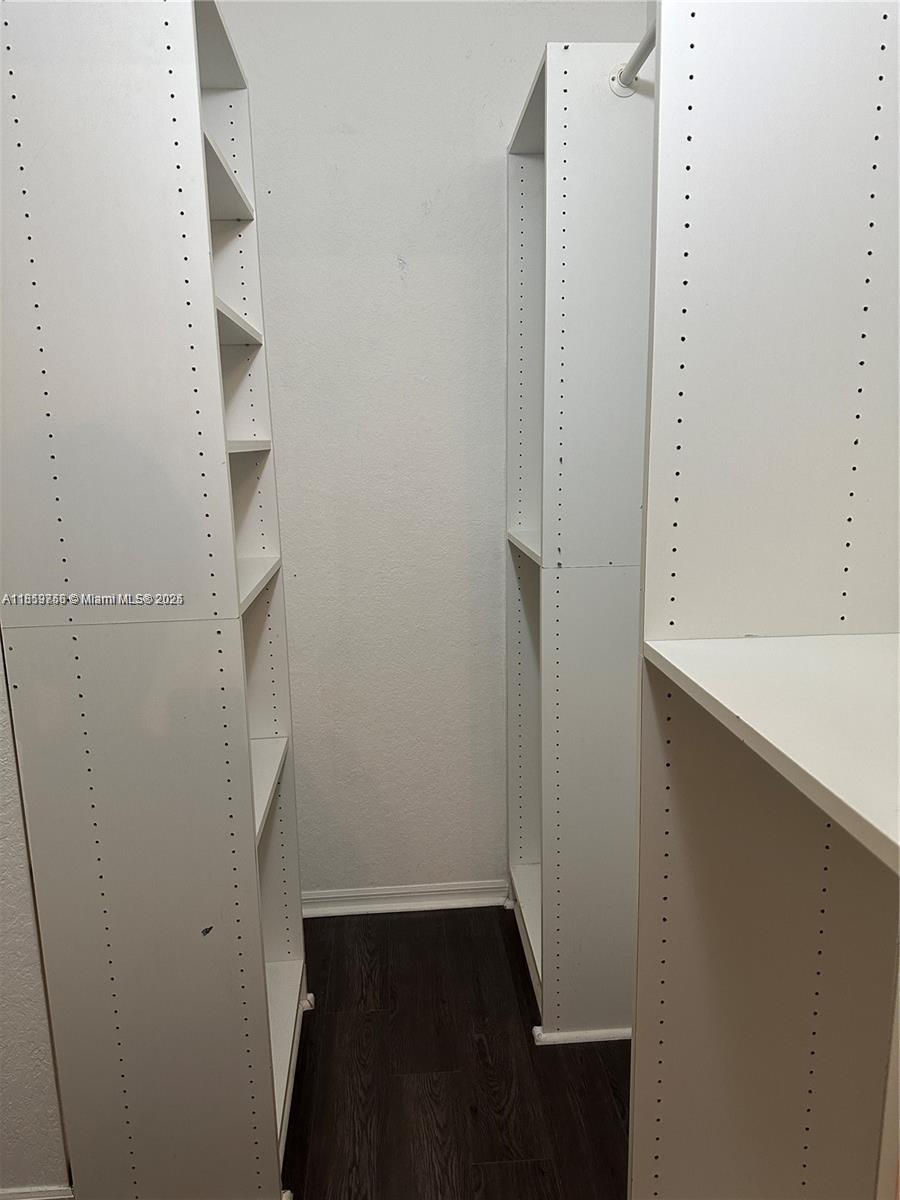 6790 West Sample Road, Unit 6790 Coral Springs, FL 33067 - Photo 21 of 26 a view of walk in closet