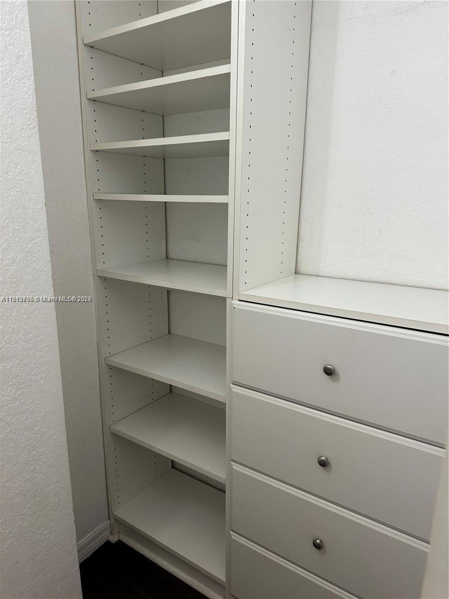 6790 West Sample Road, Unit 6790 Coral Springs, FL 33067 - Photo 22 of 26 a close view of closet