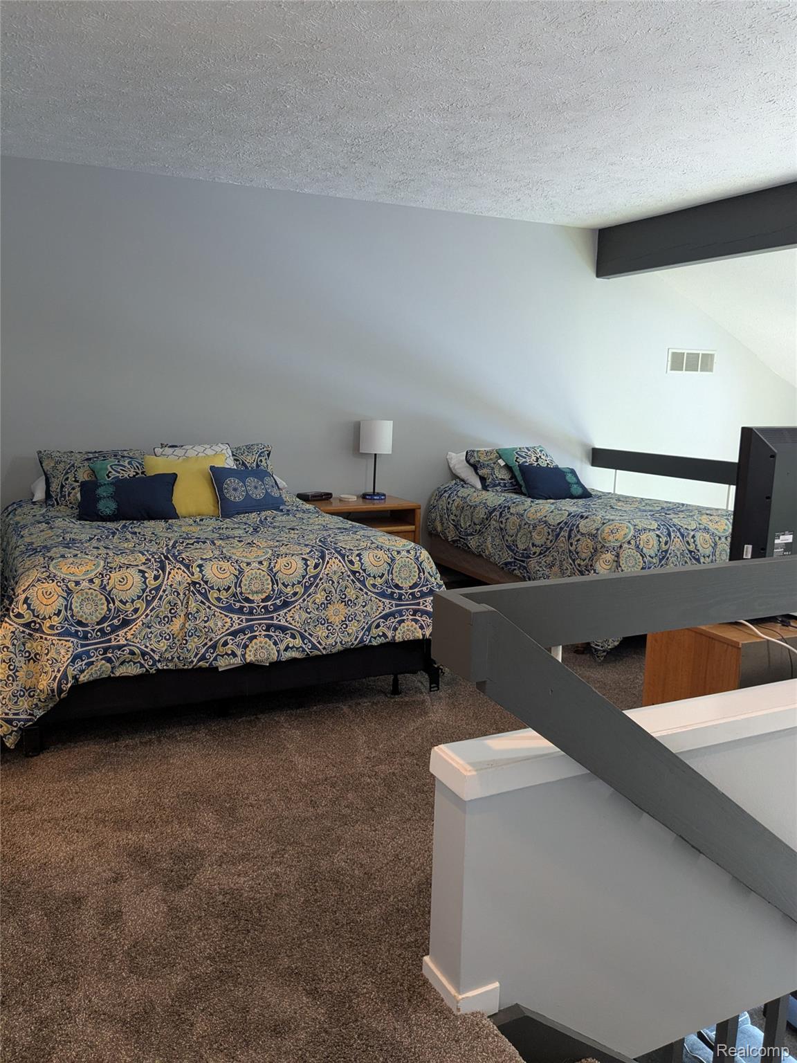 4749 South Pleasantview Road, Unit 20 Harbor Springs, MI 49740 - Photo 26 of 44 Loft Area Offers More Space for Entertaining, Sleeping or Any Comfort Needs!