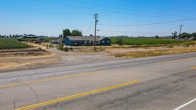 a view of street with shops