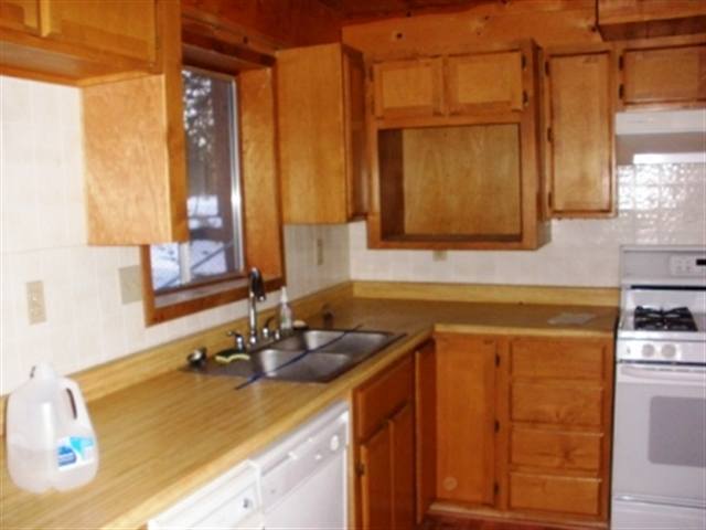 2727 High Ridge Road Overgaard, AZ 85933 - Photo 2 of 5 a bathroom with a sink and a mirror