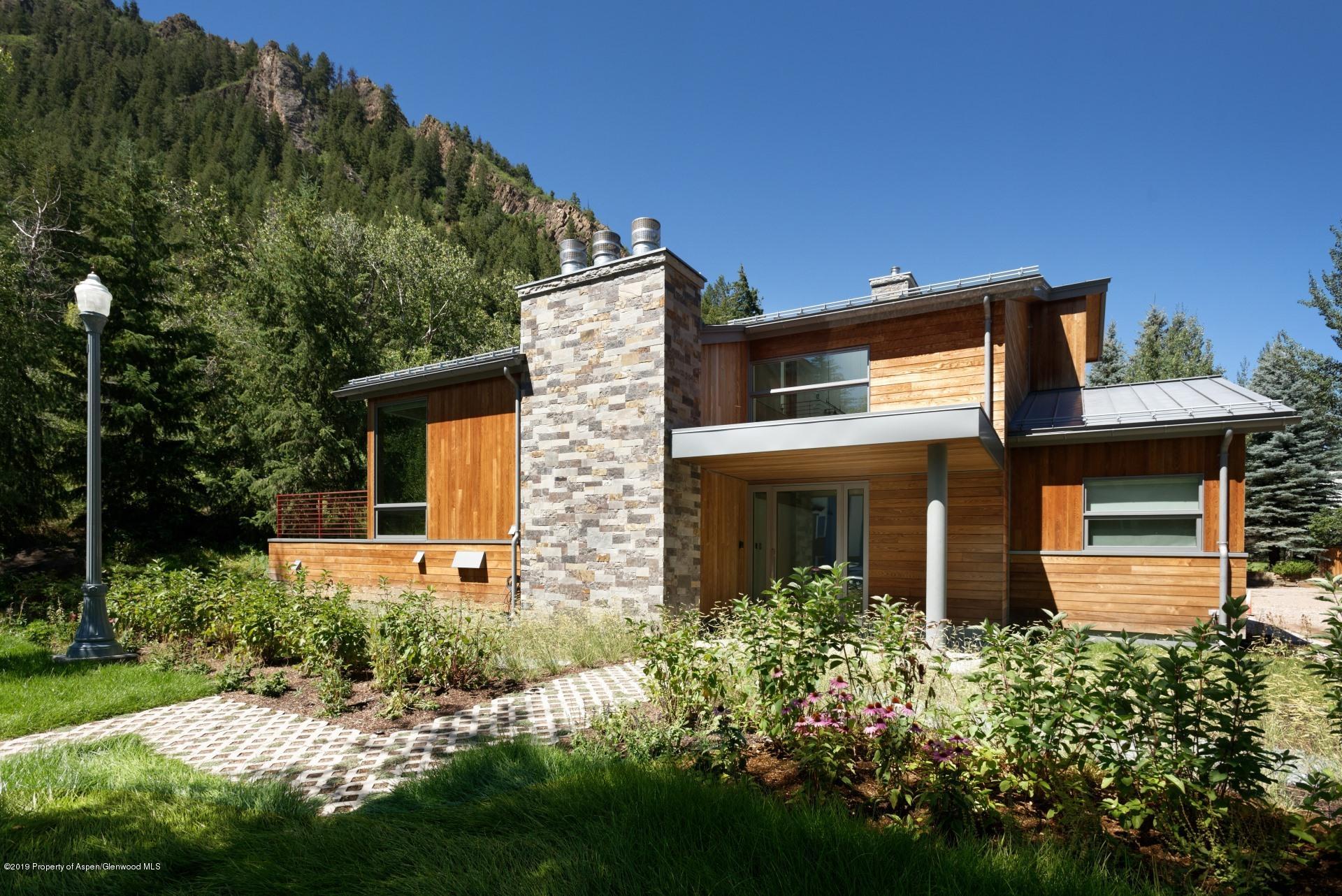 217 South 3rd Street Aspen, CO 81611 - Photo 1 of 32 front view of house with a yard