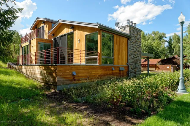a view of balcony and yard