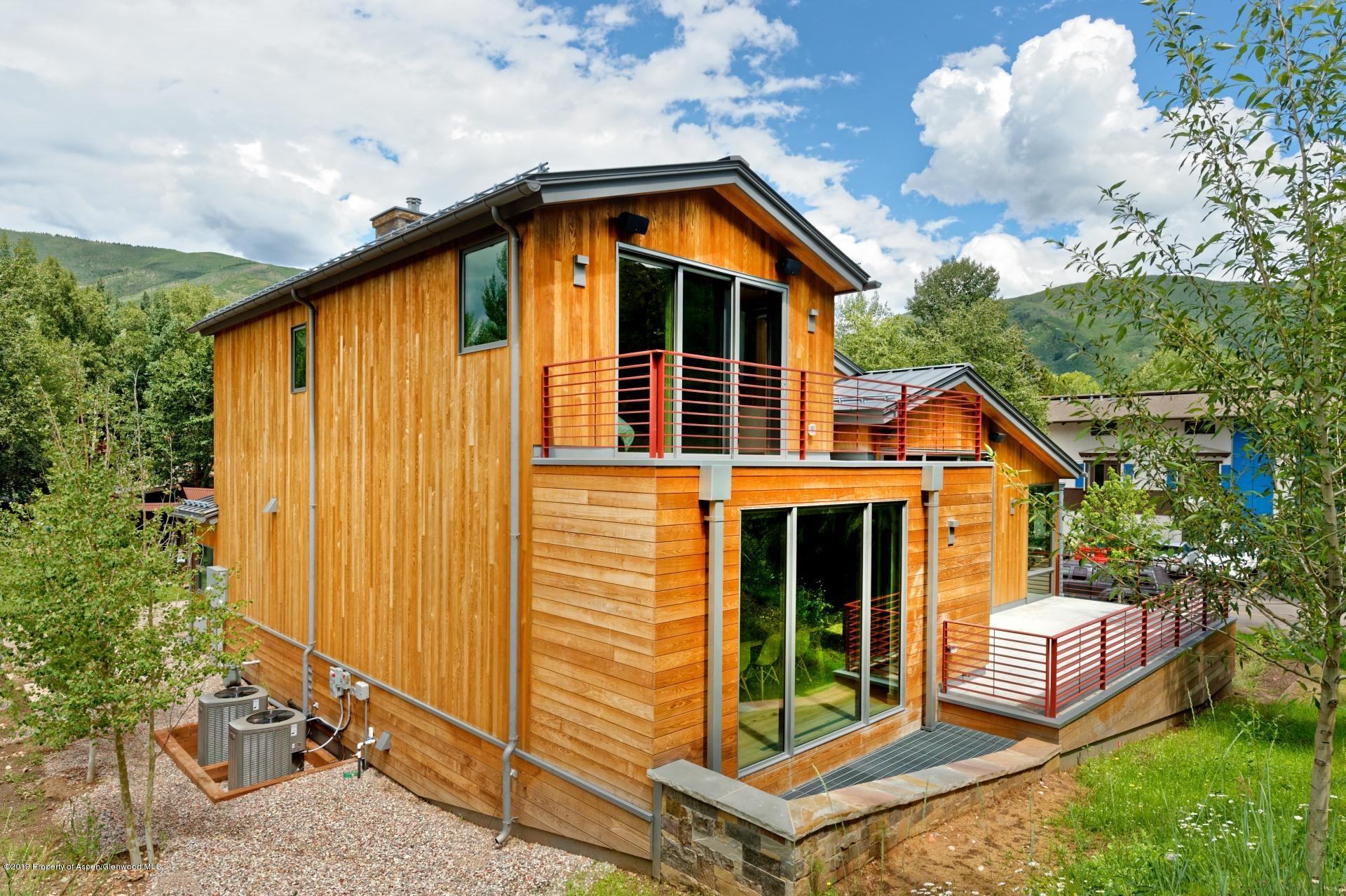 217 South 3rd Street Aspen, CO 81611 - Photo 27 of 32 a view of front of house with a yard