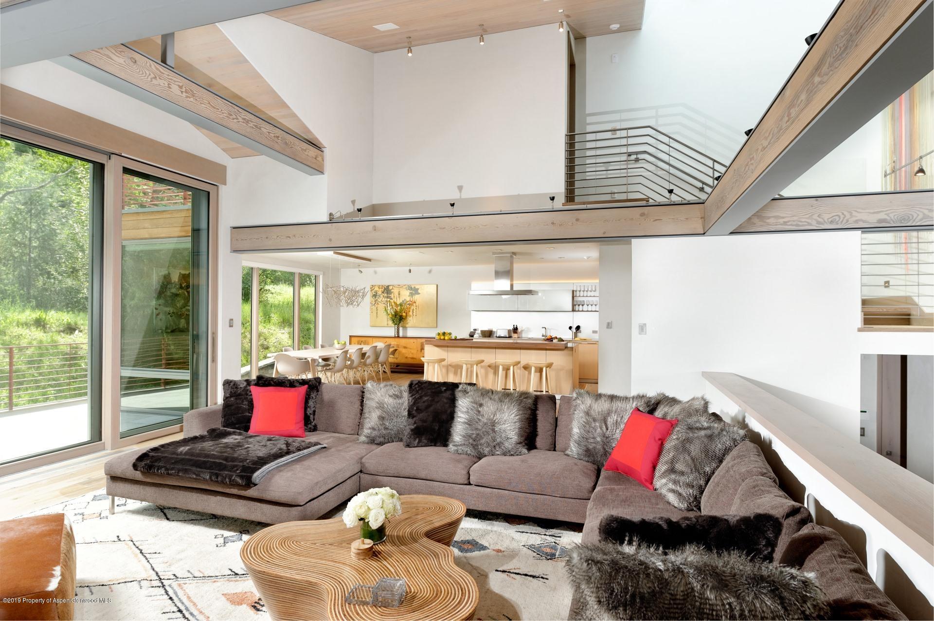 217 South 3rd Street Aspen, CO 81611 - Photo 7 of 32 a living room with furniture and a large window
