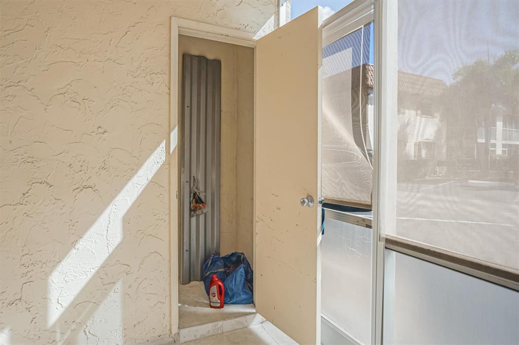 101 East McNab Road, Unit 112 Pompano Beach, FL 33060 - Photo 22 of 27 Private utility room inside patio