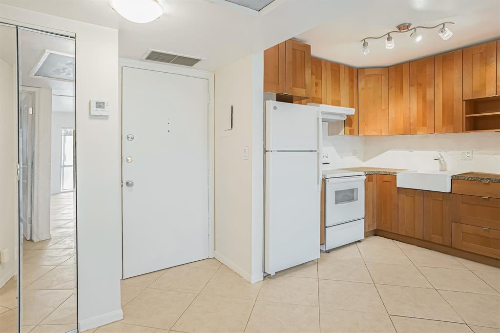 101 East McNab Road, Unit 112 Pompano Beach, FL 33060 - Photo 6 of 27 Inside Utility closet