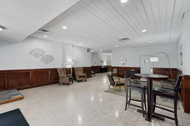 a view of a terrace with furniture