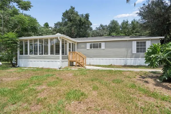a house view with a garden space