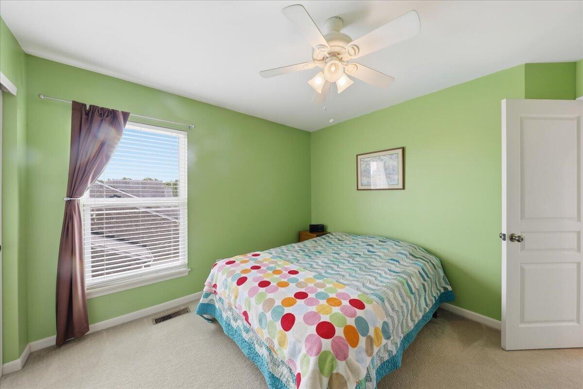 796 Rudolph Way Erlanger, KY 41018 - Photo 40 of 49 796 Rudolph Way, Erlanger KY 41018-Window with blinds, overhead ceiling fan, white paneled door, and carpeted flooring