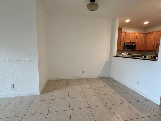 a view of a kitchen with a sink
