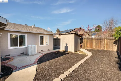 a view of a house with a patio