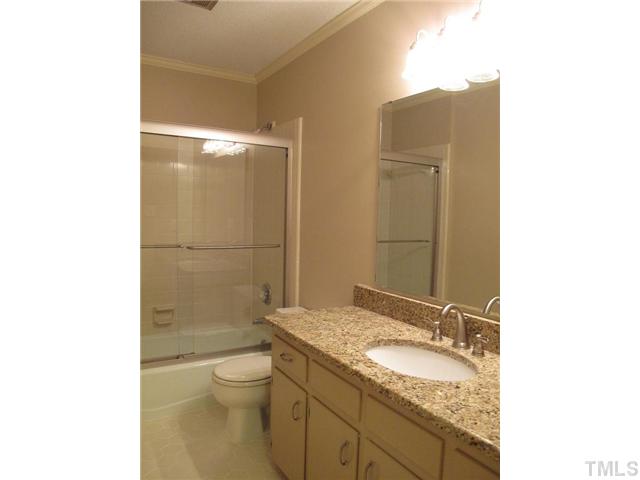 901 Skinners Ridge Road Raleigh, NC 27614 - Photo 8 of 14 a bathroom with a granite countertop sink toilet and shower